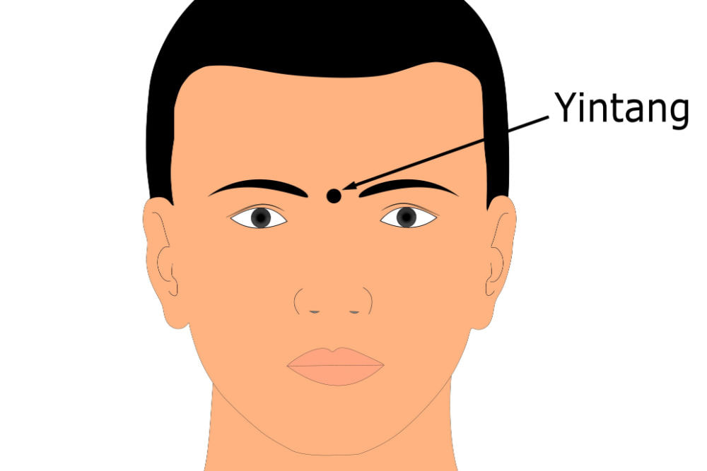 Bấm huyệt ấn đường trị mất ngủ